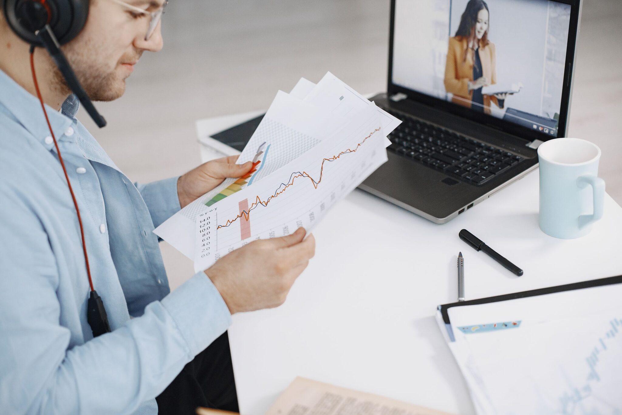 Business owner on a video call with their remote executive assistant